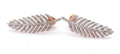 Lot 120 - A pair of 9ct diamond feather earrings, set...