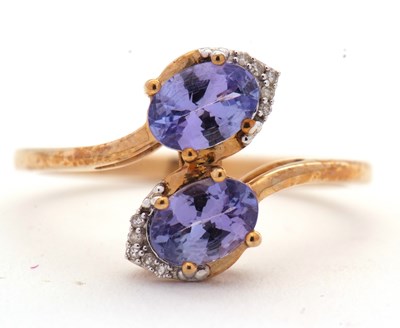 Lot 49 - A 9ct tanzanite and diamond ring, the two oval...