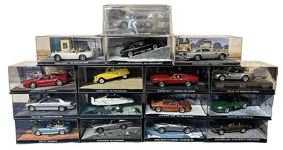 Lot 95 - A collection of various cased die-cast cars,...