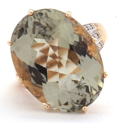 Lot 59 - A 9ct prasiolite and diamond ring, the oval...