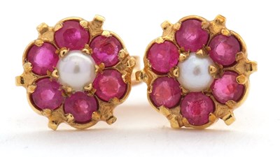 Lot 109 - A pair of 9ct ruby and split pearl cluster...