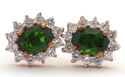 Lot 104 - A pair of 9ct diopside and white stone cluster...