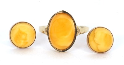 Lot 140 - A 9ct amber ring and earrings, the ring with...