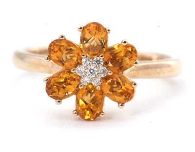 Lot 91 - A 9ct citrine and diamond ring, the flowerhead...