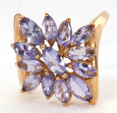 Lot 7 - A 9ct tanzanite cluster ring, comprised of...