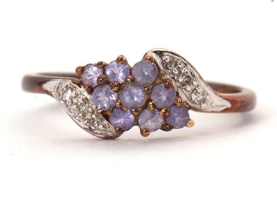 Lot 11 - A 9ct tanzanite and diamond ring, set with...