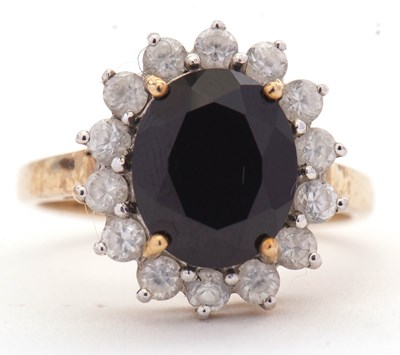 Lot 56 - A 9ct black and white stone cluster ring, 16mm...