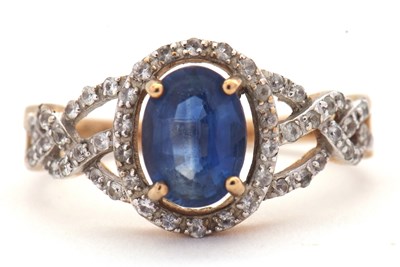Lot 58 - A 9ct kyantie and white stone ring, the oval...