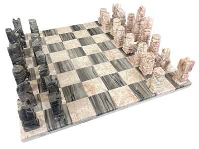 Lot 278 - A retro onyx chessboard and geometric pieces...