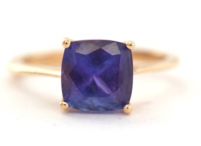Lot 66 - An 18K tanzanite ring, the cushion cut...