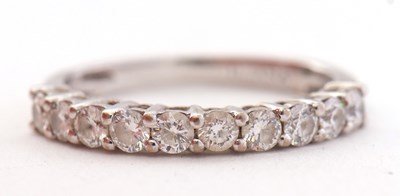 Lot 64 - A ten stone diamond ring, set with round...