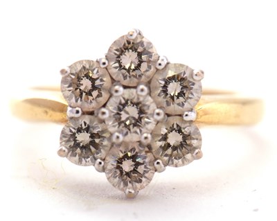 Lot 68 - An 18ct diamond cluster ring, set with round...