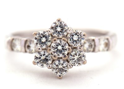 Lot 73 - A 14ct diamond cluster ring, set with round...