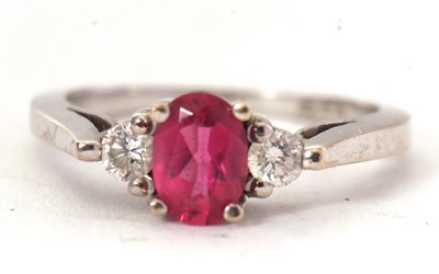 Lot 67 - An 18ct rubelite and diamond ring, the oval...