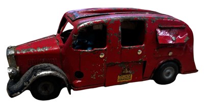 Lot 181 - A playworn tinplate Triang Minic fire-engine,...