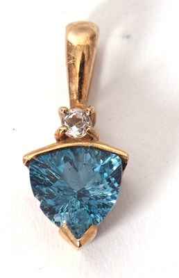 Lot 111 - A 9ct 'London' blue and white topaz pendant,...