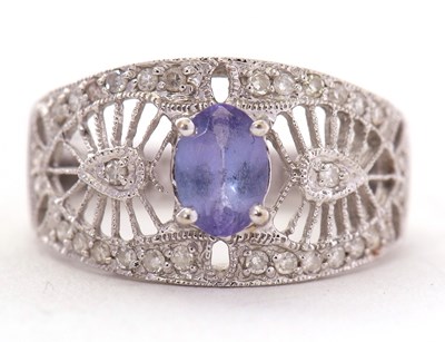 Lot 62 - A 14ct tanzanite and diamond ring, the 12mm...