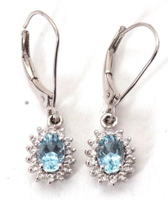 Lot 97 - A pair of 9K aquamarine and zircon earrings,...