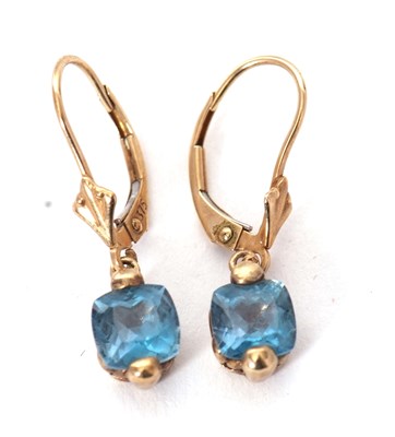 Lot 96 - A pair of blue topaz earrings, the mixed cut...