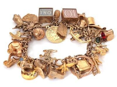 Lot 157 - A 9ct charm bracelet, with links and clasp...