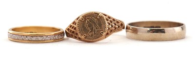 Lot 86 - Three gold rings: to include an 18ct two tone...