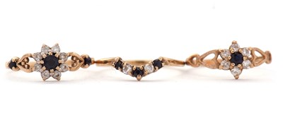Lot 83 - Three 9ct sapphire and CZ rings, size J, K and...