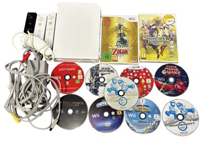 Lot 325 - A Nintendo Wii console, together with 3...
