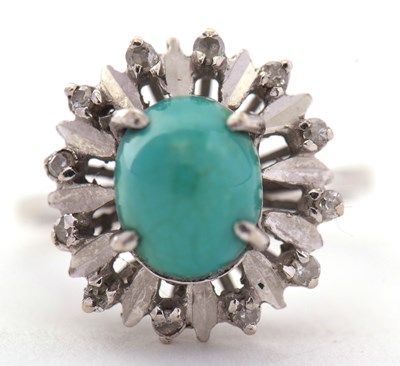 Lot 20 - A turquoise and diamond ring, the oval...