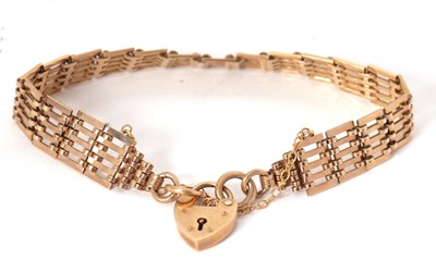 Lot 155 - A 9ct gate bracelet, 10mm wide, 18cm long,...