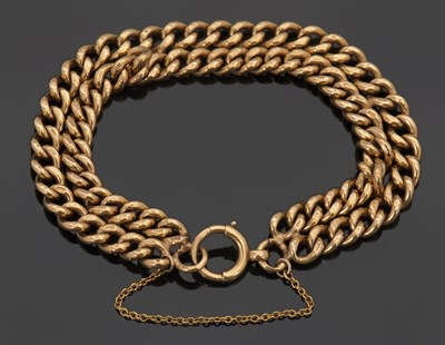 Lot 344 - A 9ct curblink bracelet, the double curblink...