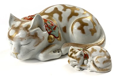 Lot 213 - A large Japanese porcelain model of a cat...