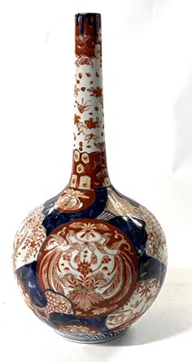 Lot 230 - A Japanese porcelain vase of bottle shape with...