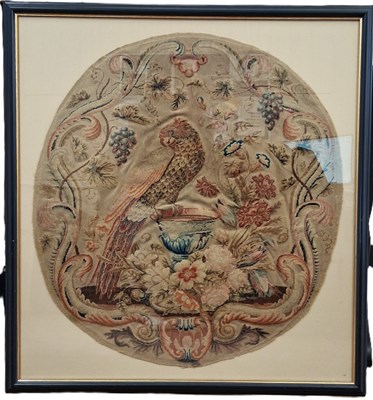 Lot 124 - A 19th century needlework picture, the round...