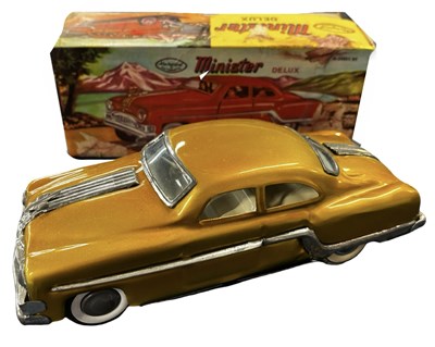 Lot 175 - A boxed Minister Delux gold tinplate model car