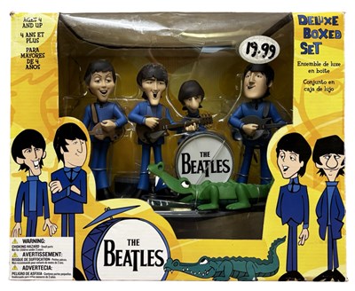 Lot 247 - The Beatles deluxe boxed set cartoon figures...