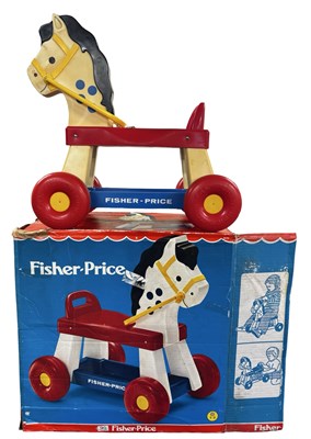 Lot 289 - A vintage boxed Fisher Price ride-on horse