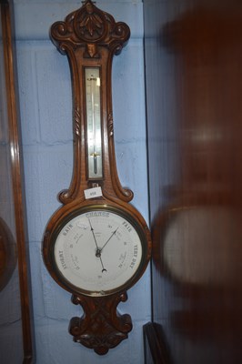 Lot 458 - A late 19th Century oak cased banjo barometer,...