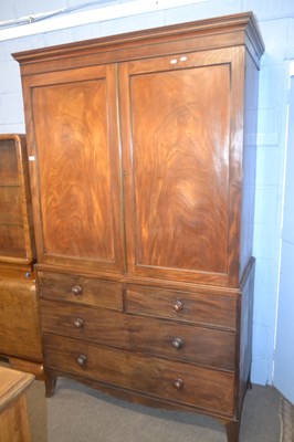 Lot 457 - A George III mahogany linen press cabinet with...