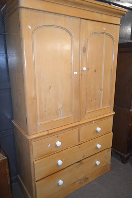 Lot 460 - A Victorian pine linen press cabinet with...