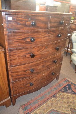 Lot 674 - A late Georgian mahogany bow front chest of...
