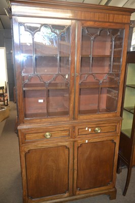 Lot 382 - A late Georgian mahogany bookcase cabinet of...