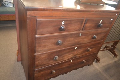 Lot 471 - A late Georgian mahogany chest of two short...