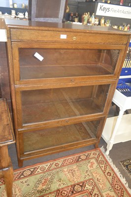 Lot 500 - An early 20th Century three tier stacking...