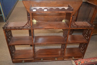 Lot 525 - A set of Georgian style mahogany shelves with...