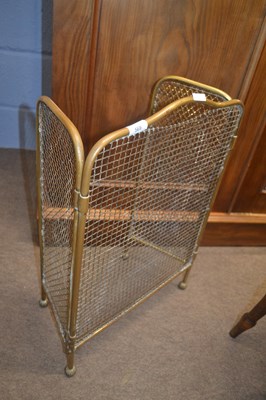 Lot 569 - A brass framed mesh spark guard