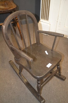 Lot 573 - A 20th Century child's rocking chair 55cm high
