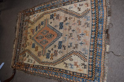 Lot 701 - Small Middle Eastern wool floor rug with a...