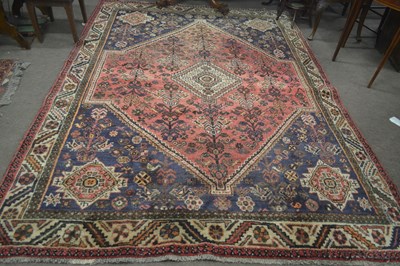 Lot 619 - A large 20th Century Turkish wool floor rug...