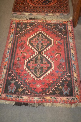Lot 621 - A small 20th Century Middle Eastern wool floor...