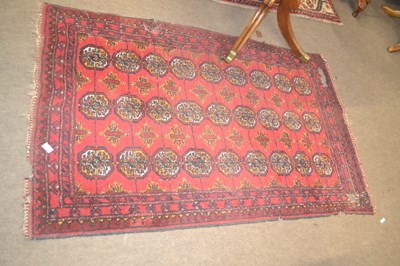 Lot 623 - A Middle Eastern wool floor rug with a...